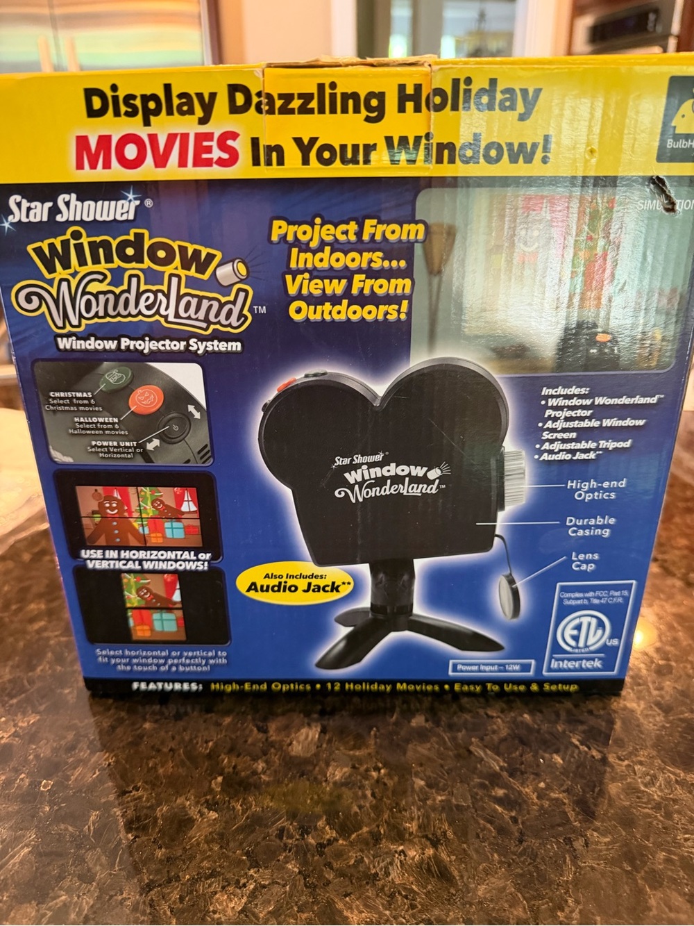 Star Shower Window Wonderland Holiday Projector in Black